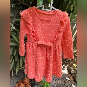 Orange dress with white dots